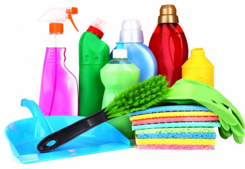 Move out cleaning checklist and supplies in a bright room