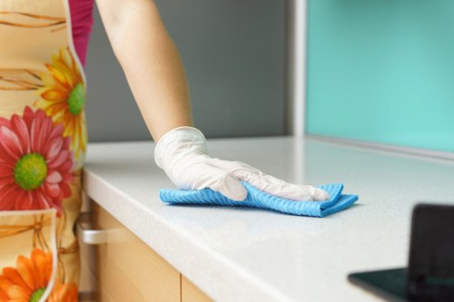 Fresh mattress cleaning process in a bright bedroom