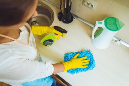 Inspection and stain treatment during rug cleaning service